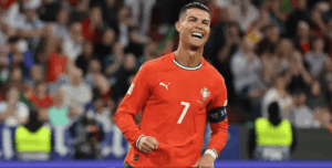 Cridtiano Ronaldo displays a wide smile while playing for Portugal in file photo.
