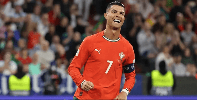 Cridtiano Ronaldo displays a wide smile while playing for Portugal in file photo.