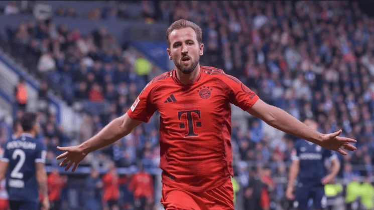 Striker Harry Kane spreads his arms while running the field for Bayern Munich in file photo. 