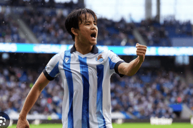 Japan's Takefusa Ku o pumps his left fist and roars after a play for his team in file photo.