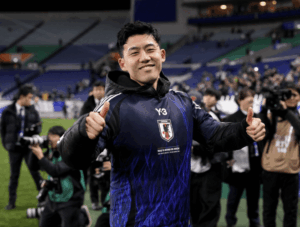 Midfielder Wataru Endo smiles to the crowd while playing for Japan's men's national team in file photo. FIFA World Cup 2026 Profile: Wataru Endo