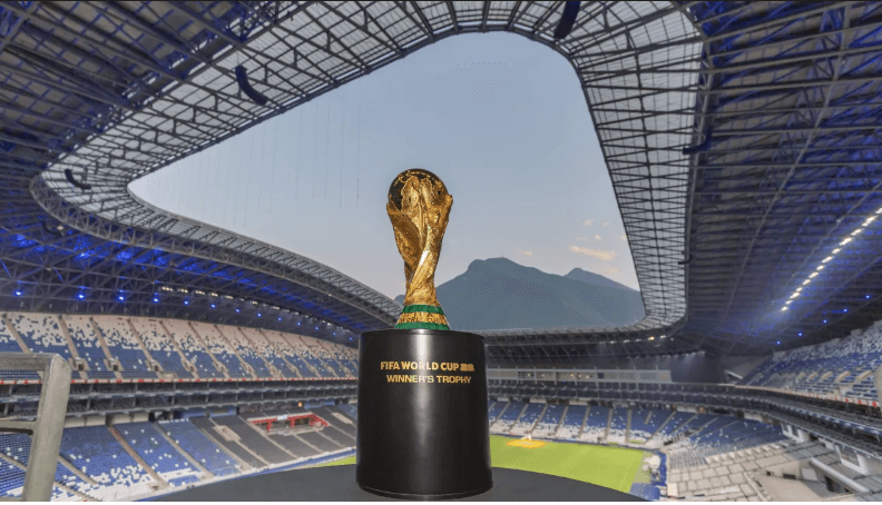An image of the FIFA World Cup 2026 winner's trophy amid a stadium background is seen in file photo. FIFA World Cup 2026 hospitality packages unveiled, offers options
