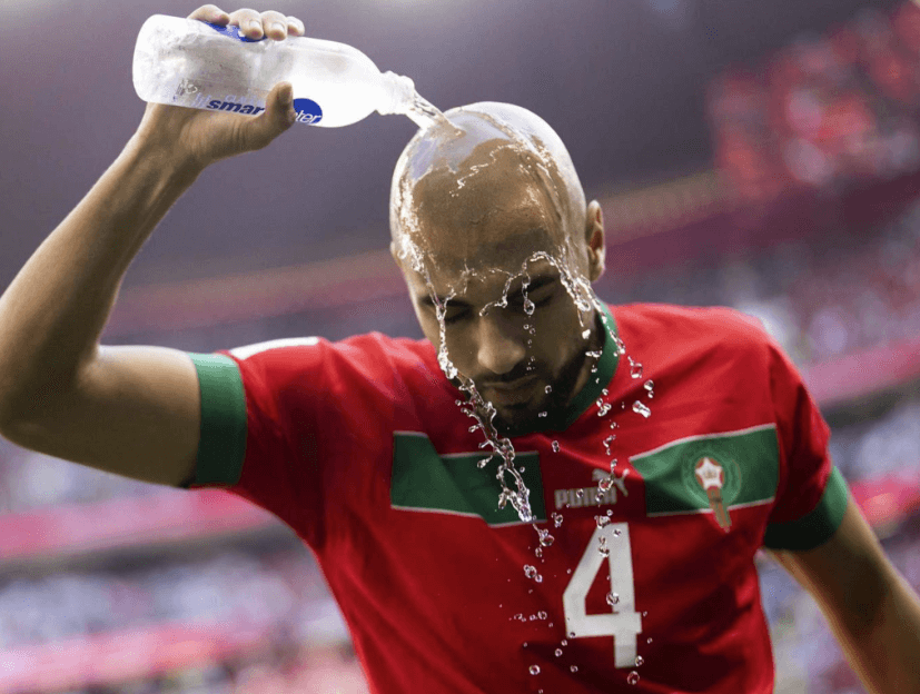 A player quenches himself with cold water amid searing heat conditions in football matches in the US this year. FIFA World Cup 2026 could be 'most climate changing': report