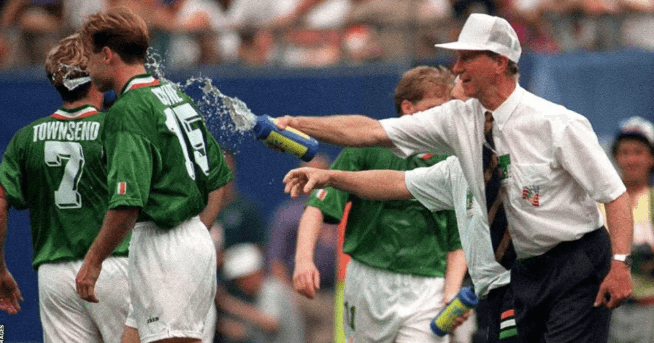 A team staff pours water to players returning to the pitch at a football match amid soaring hot conditions in file photo. FIFA World Cup 2026 could be 'most climate changing': report