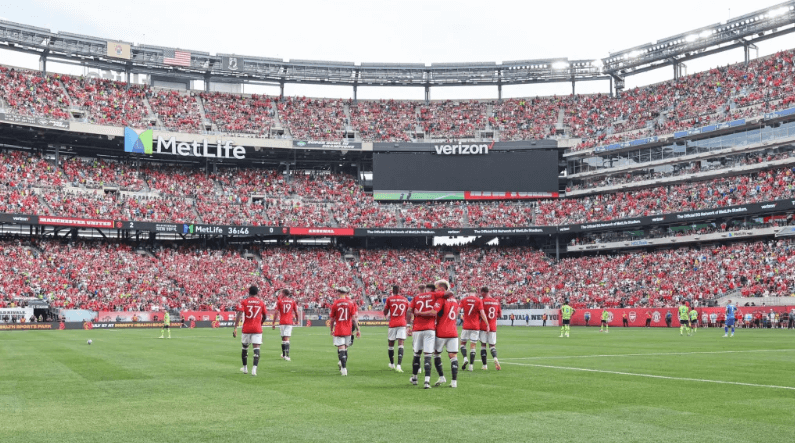 An image of football players at a huddle at MetLife Stadium in New Jersey is shown in file photo. FIFA World Cup 2026 start time change pushed, cites conditions