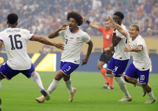 Players from the US Ment's National Team (USMNT ), in white, run at the field during a match in file photo. USMNT's World Cup 2026 buildup resumes vs Ecuador, Australia