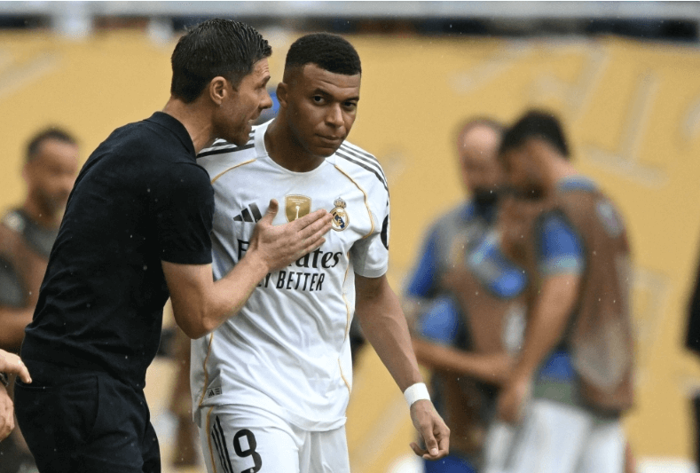 Real Madrid coach Xabi Alonso (left) gives instructions to star forward Kylian Mbappe (right) in file photo. PSG vs Real Madrid sees Parisians reach CWC final vs Chelsea