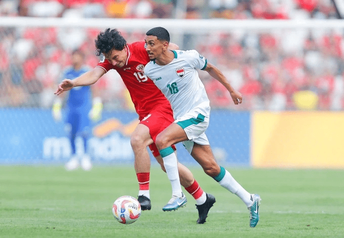Get ready for exciting plays as Iraq (in white shirts) vs Indonesia (in red shirt) unfolds at a 2026 FIFA World Cup AFC qualifier at the King Abdullah Sports City Stadium in Jeddah on October 12, 2025. Photo by IFA.