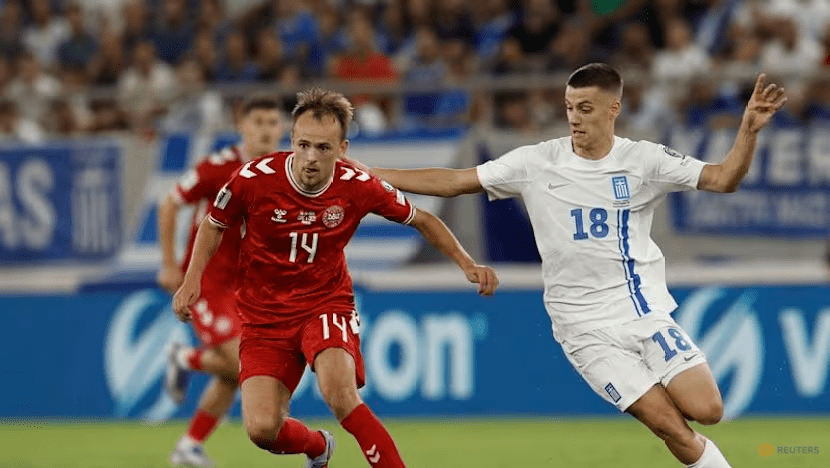 Mikeel Damsgaard (14) has all eyes on the ball against Greece's Giannis Konstantelias (18) in the Greece vs Denmark fixture on September 9, 2025 (Photo by Reuters)