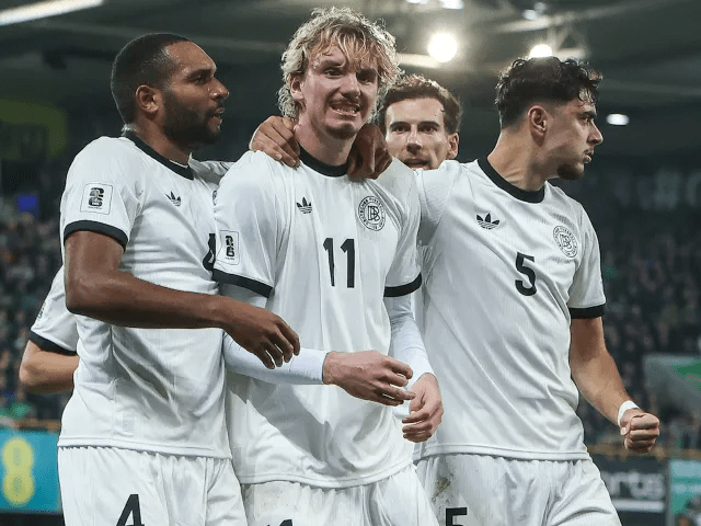 Nick Woltemade (11, middle) was mobbed by his teammates after his first-half goal helped Germany beat Northern Ireland.