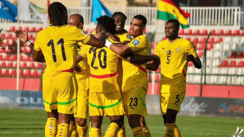 Players from Ghana gather in a huddle to celebrate the team's qualification in the 2026 FIFA World Cup