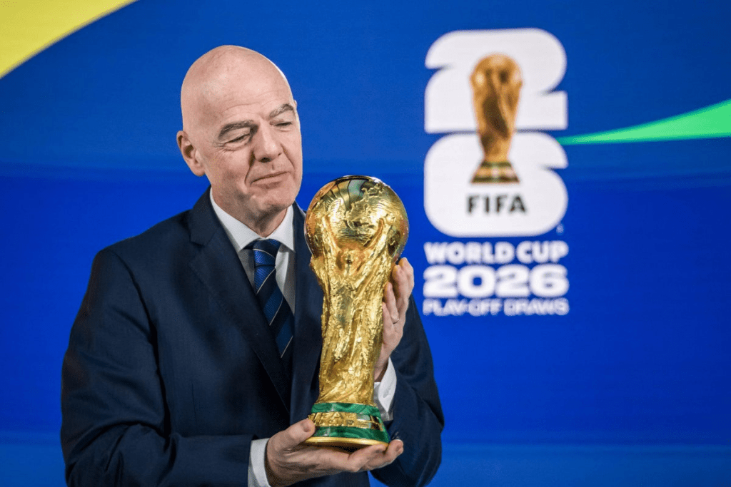 FIFA Presisdent Gianni Infantino holds the World Cup 2026 trophy.