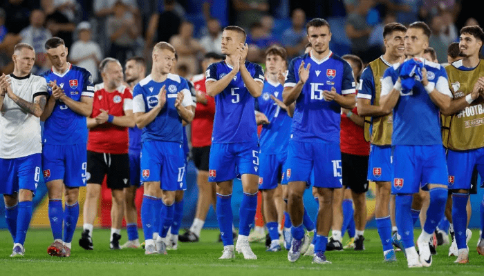 Slovakia players cap their hands after a match after stunning Germay, 2-0, in a UEFA World Cup Qualifiers match in September 2025.