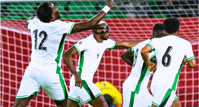 Victor Osimhen celebrates with his teammates after his brace lifted Nigeria to victory over Gabon in extra time.