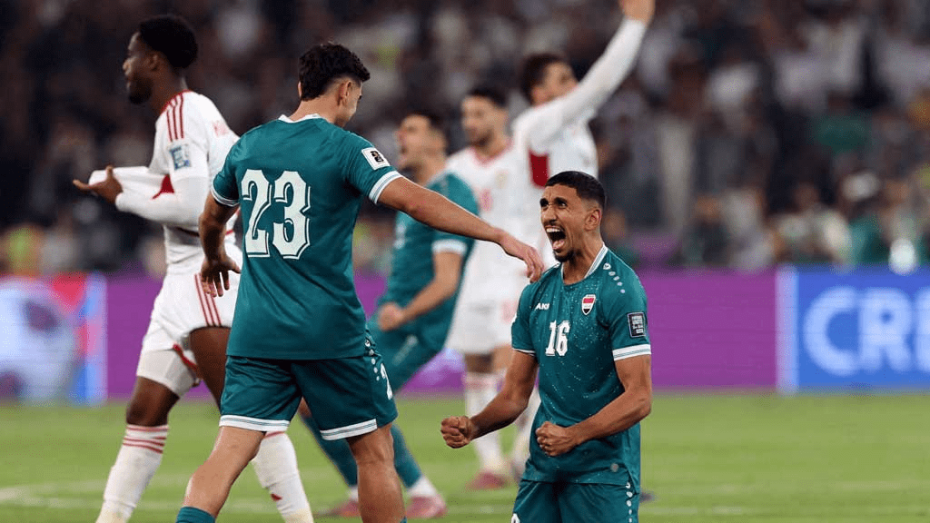 Amir Al-Ammari (16) celebrates with teammate Merchas Doski (23) after scoring off a penalry for Iraq against the UAE in their AFC World Cup Qualifers fixture.