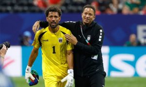 Cabo Verde goal keeper with coach